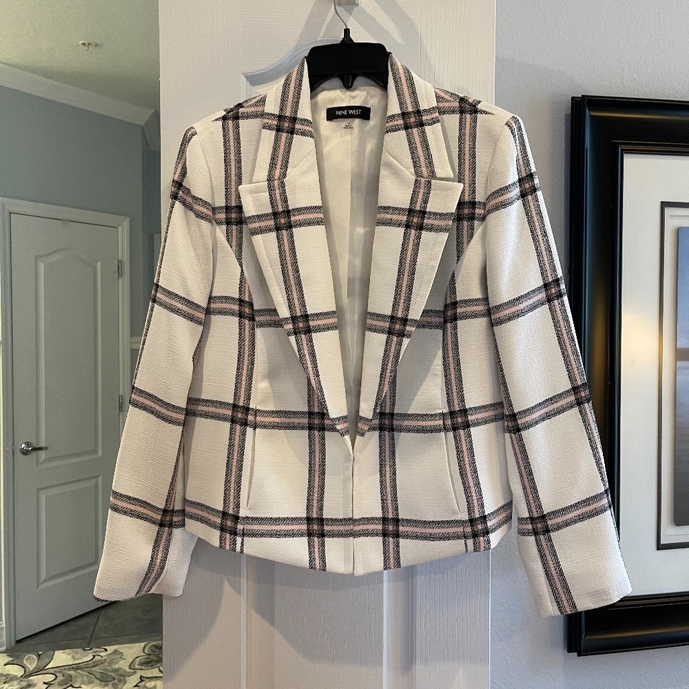 White blazer; black and pink stripes